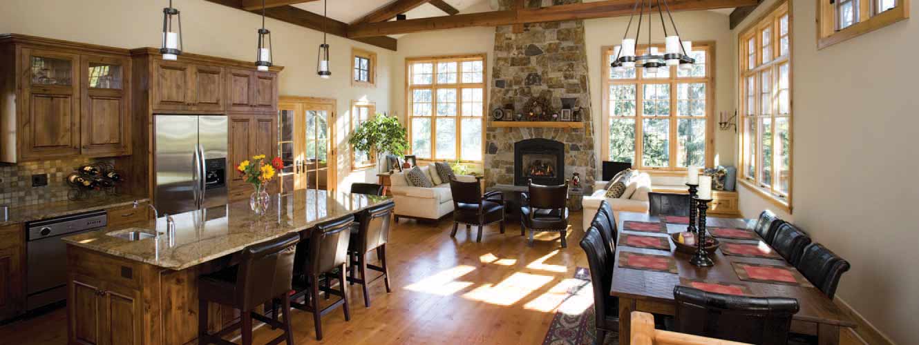 Picture of kitchen and dining room area with vaulted ceilings